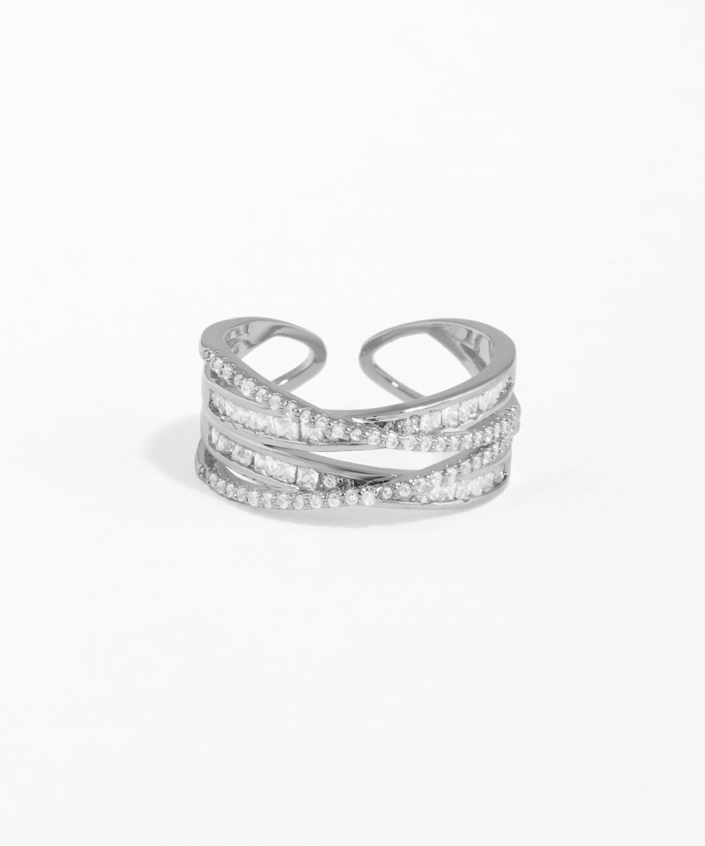 Silver ring with gemstones on a white background