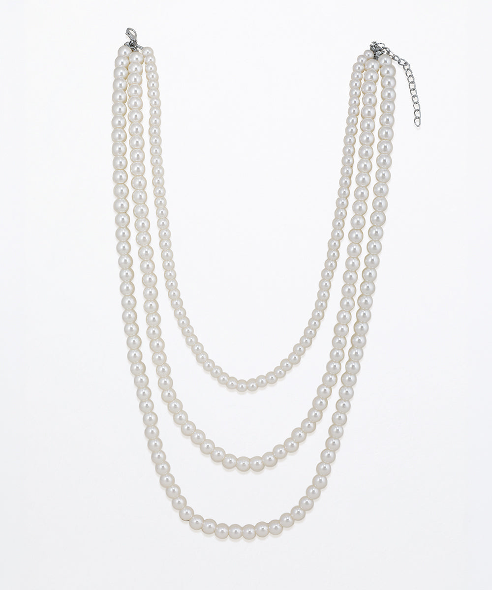 Rhodium finish multi-strand necklace with graduated faux pearls