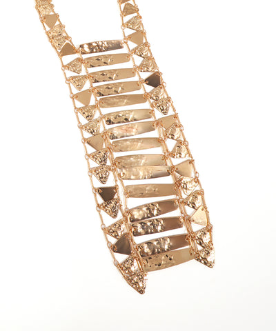 Gold necklace with geometric design on a white background