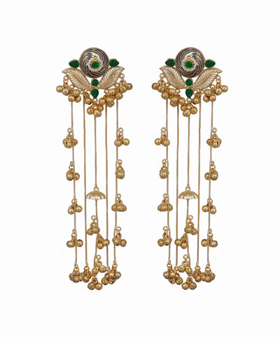 Pair of gold earrings with green gemstones on a white background