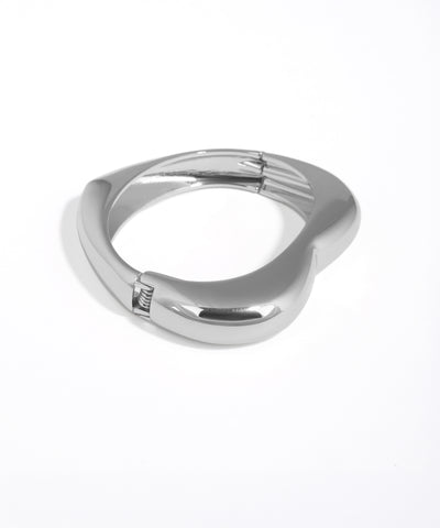 Silver ring with a unique design on a white background