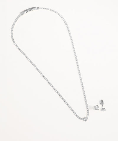 Silver necklace and earrings on a white background