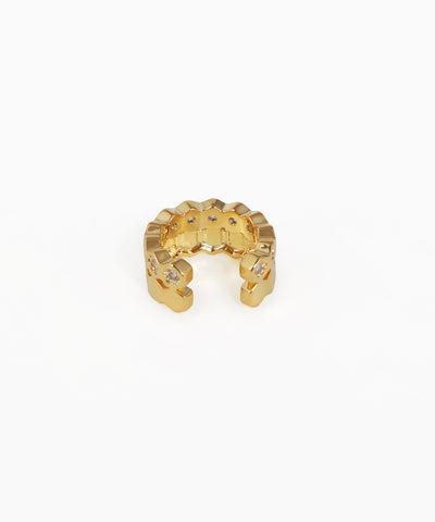 Gold ring with small diamonds on a white background