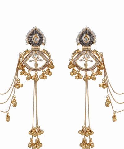 Pair of ornate gold earrings with intricate designs on a white background