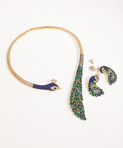 Gold-tone necklace and drop earrings set with blue, green, and clear CZ stones in an elaborate peacock design.