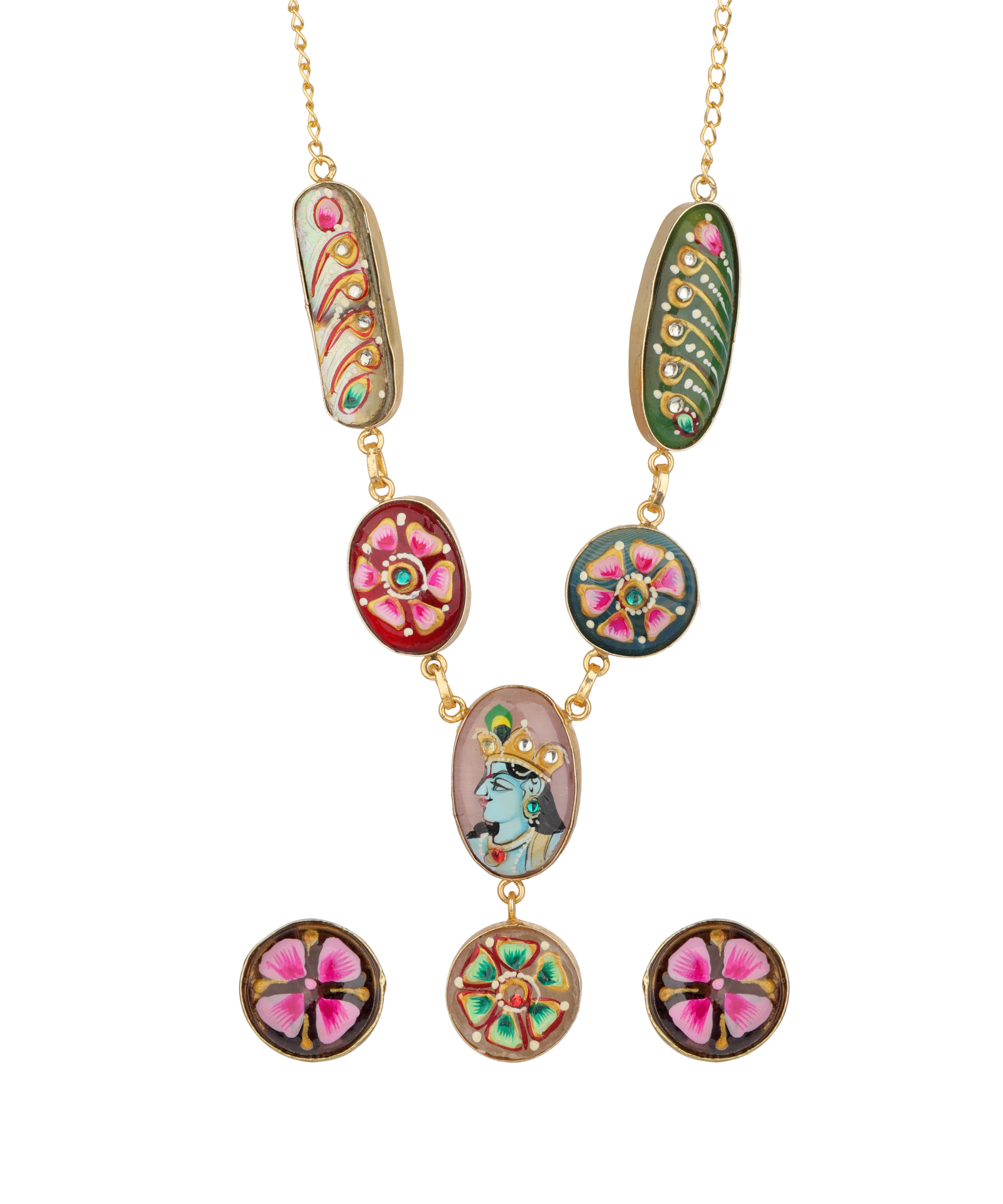 Gold-plated necklace and matching stud earrings featuring colorful, hand-painted enamel motifs including floral designs, paisley, and a central figure, set against a plain white background.