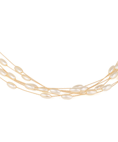Multi-strand pearl necklace on a white background