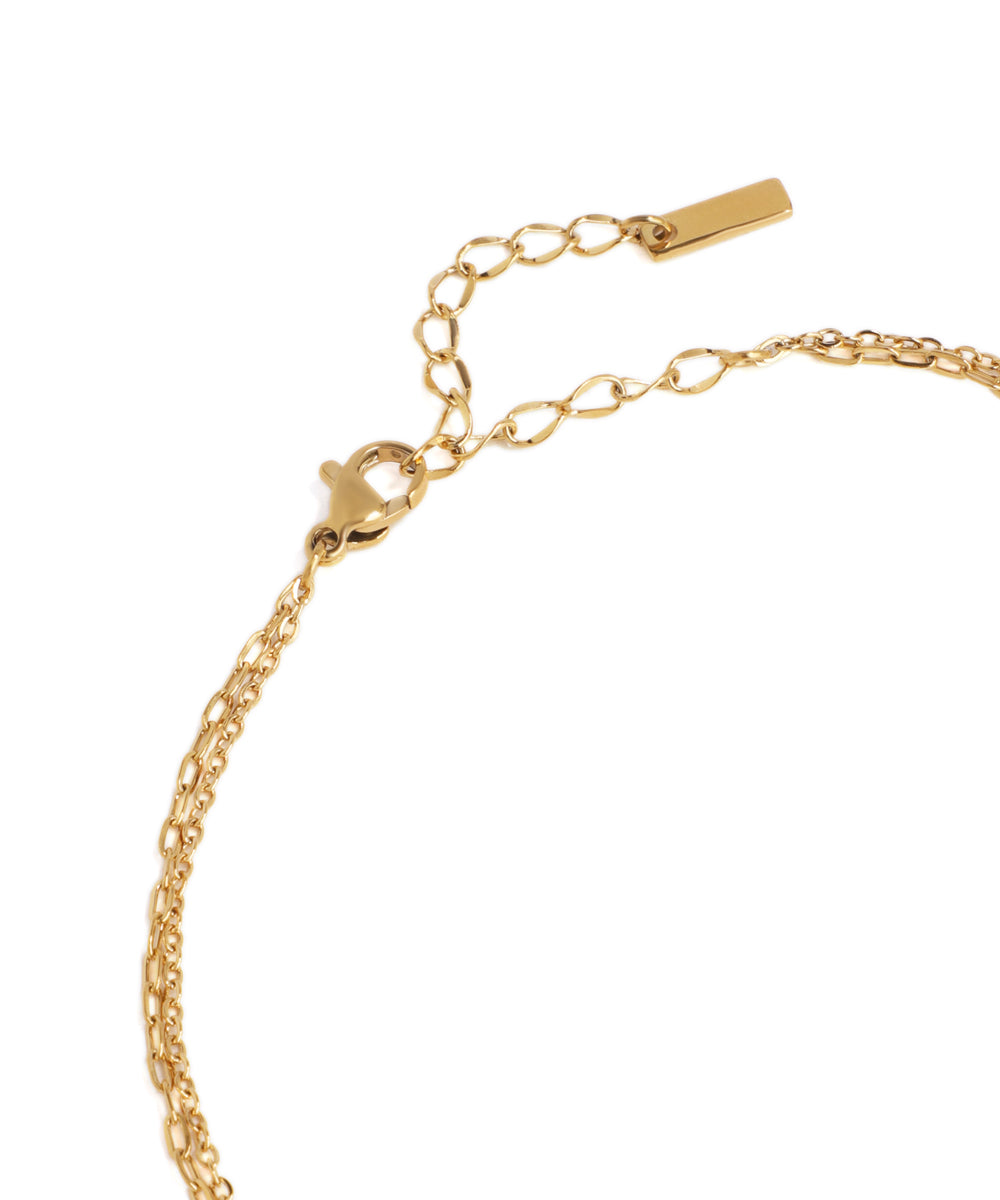 Gold bracelet on a white background