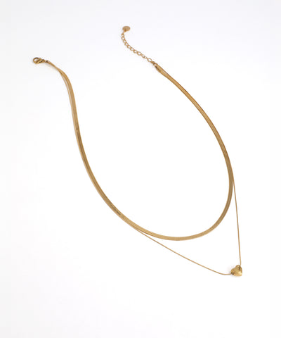 Gold necklace on a white background