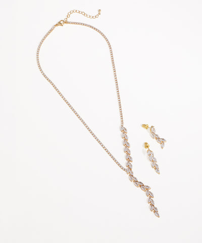 Gold-tone necklace and earrings set with marquise-cut clear stones in a leaf-like drop design