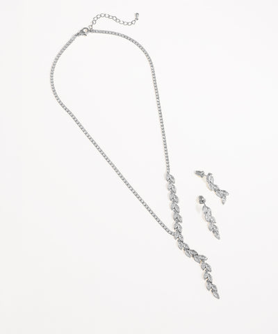 Silver necklace and earrings set on a white background