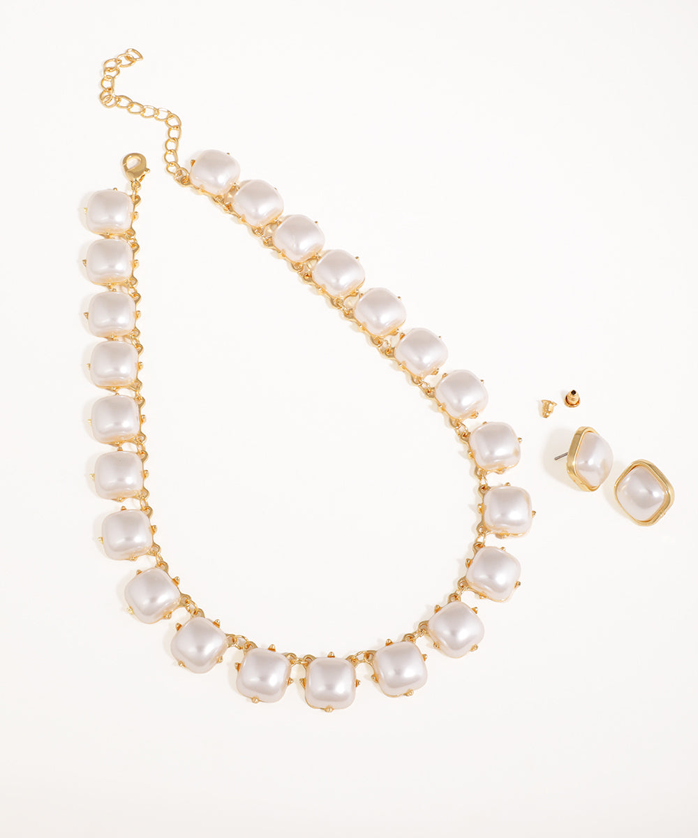 Gold-tone necklace and stud earrings set with linked square faux pearl motifs