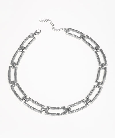 Silver chain necklace on a white background
