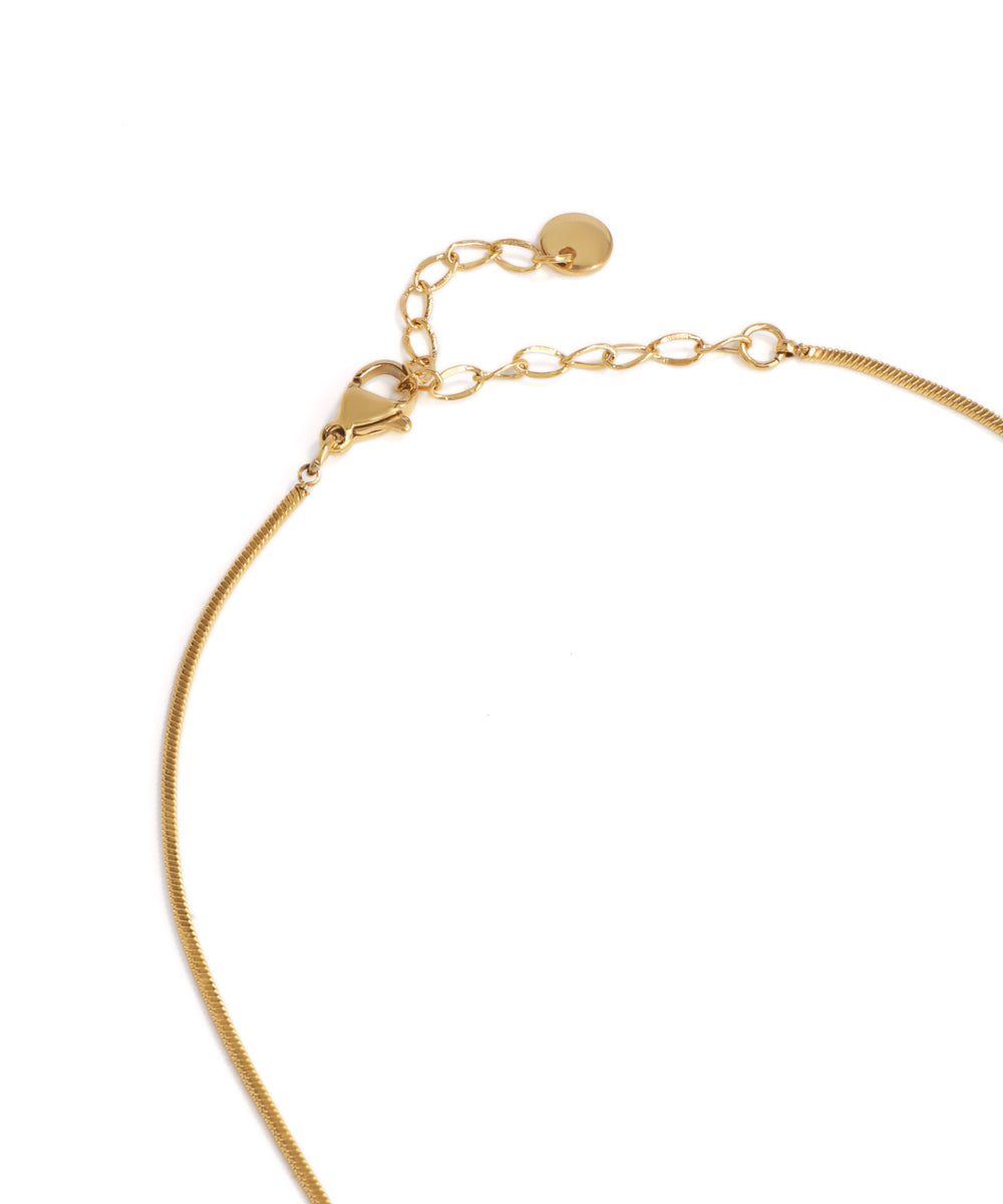Gold bracelet on a white background