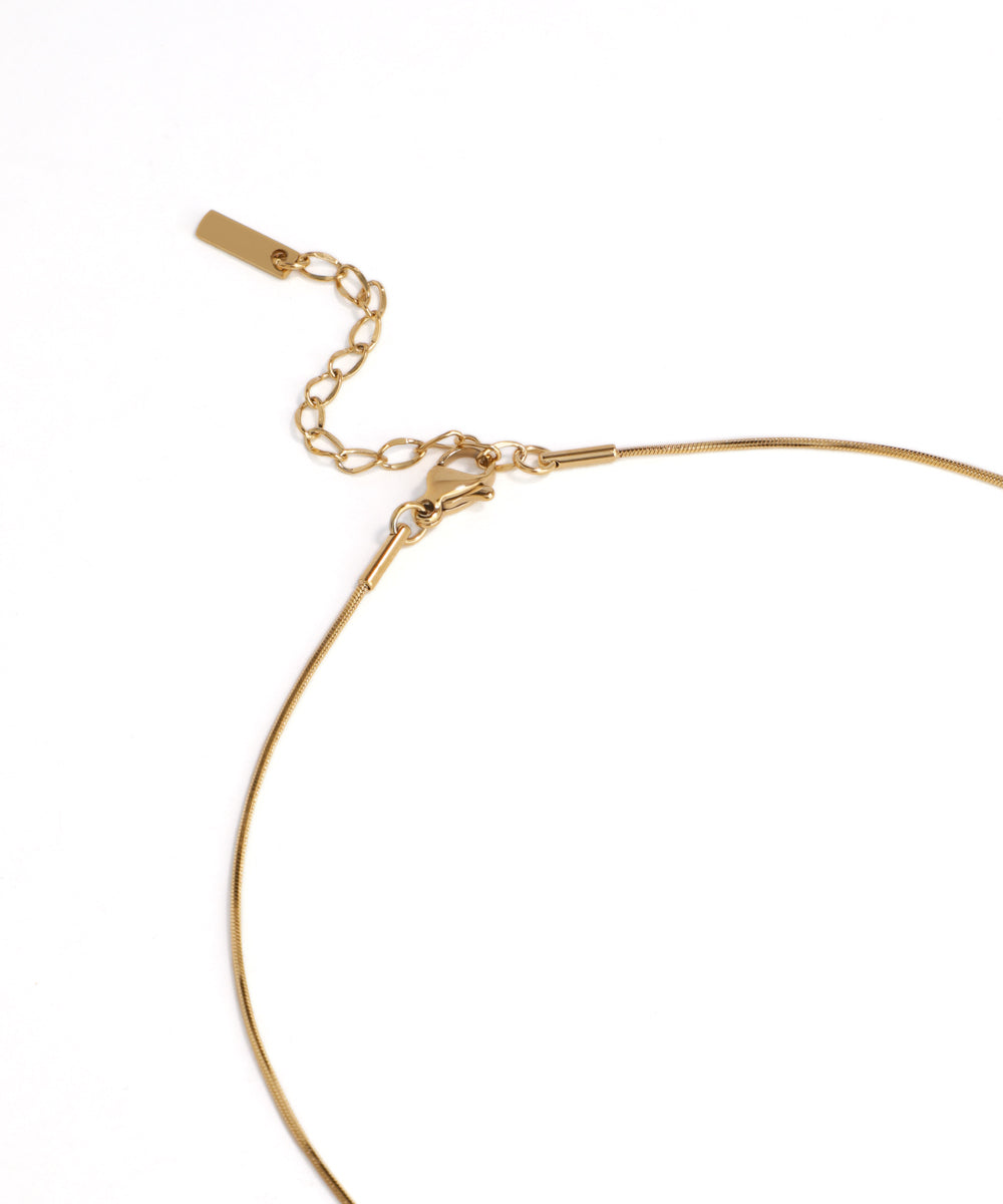 Gold bracelet on a white background