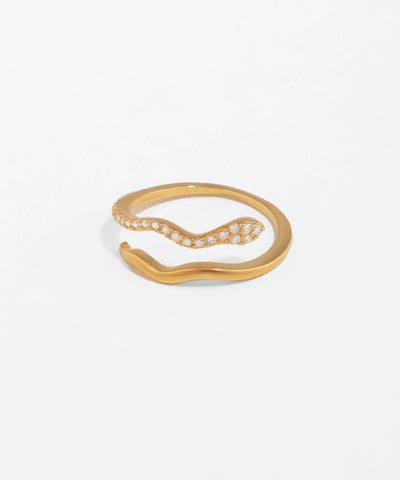 Gold ring with small diamonds on a white background