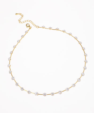 Gold-tone necklace with clear cubic zirconia stones set along the chain