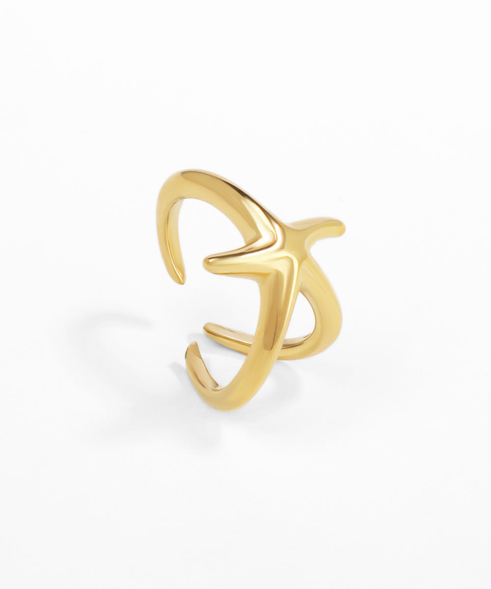 Gold open ring on a white background