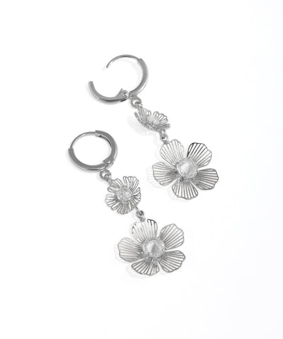 Silver floral earrings on a white background