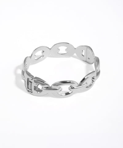 Silver chain-link ring on a white background