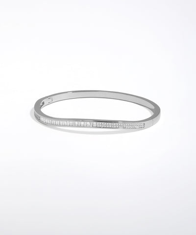 Silver bracelet with small stones on a white background