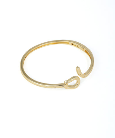 Gold bracelet on a white background