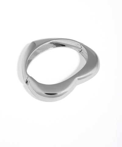 Silver ring with a unique design on a white background