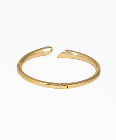 Gold bracelet on a white background