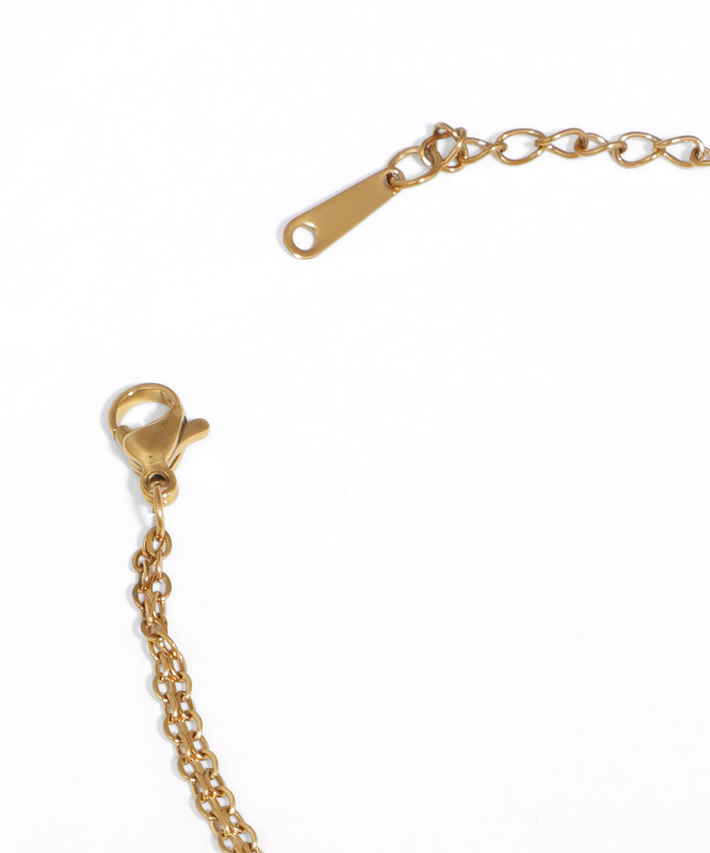 Gold chain with clasp on a white background