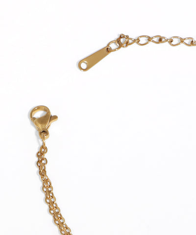 Gold chain with clasp on a white background