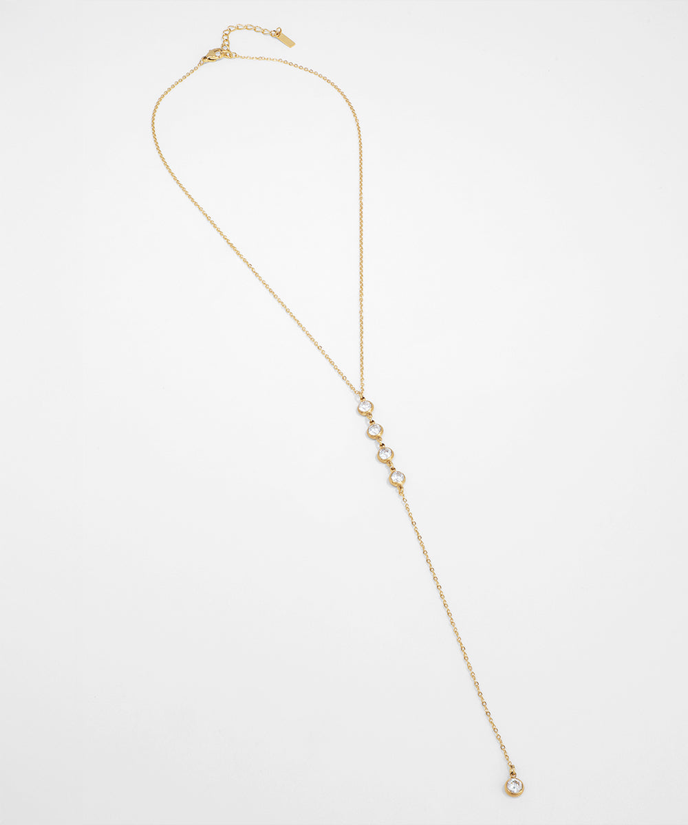Gold necklace on a white background