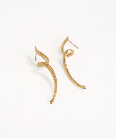 Gold hoop earrings on a white background