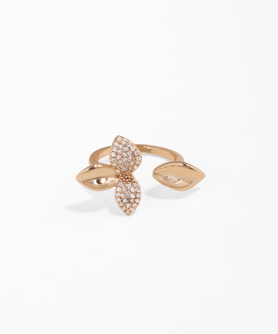 Rose gold ring with leaf design on a white background