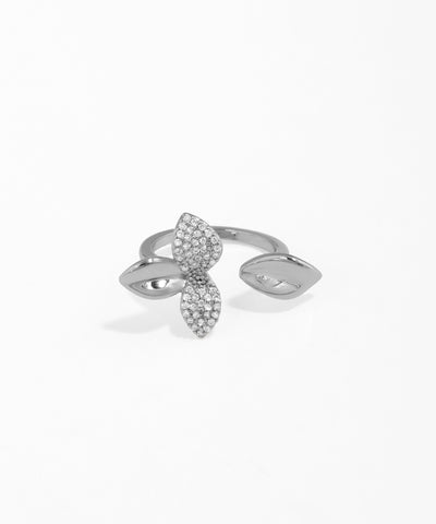 Silver ring with leaf design on a white background
