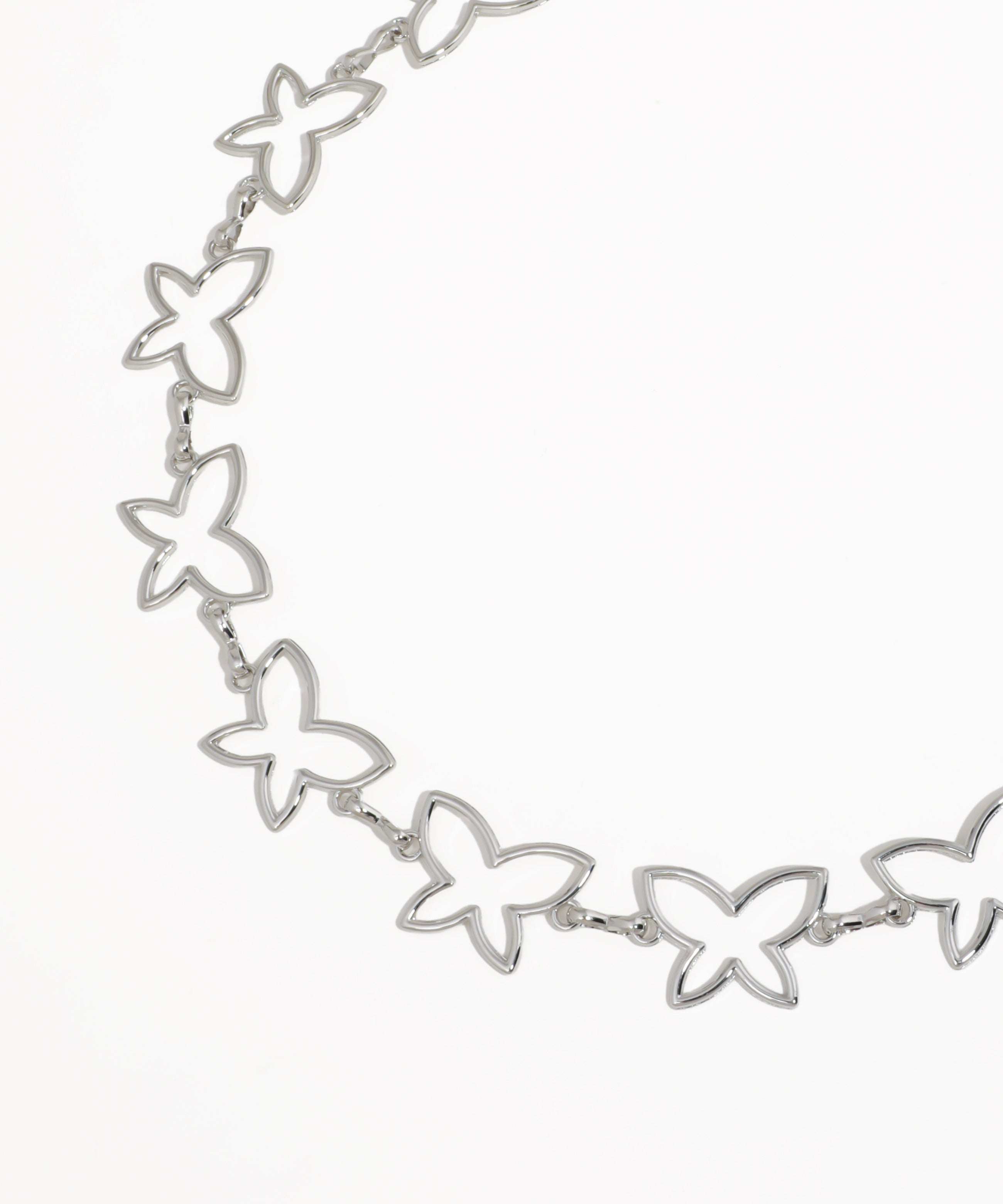 Silver butterfly necklace on a white background