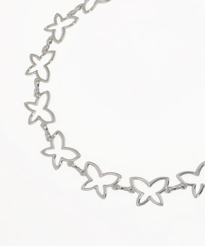 Silver butterfly necklace on a white background