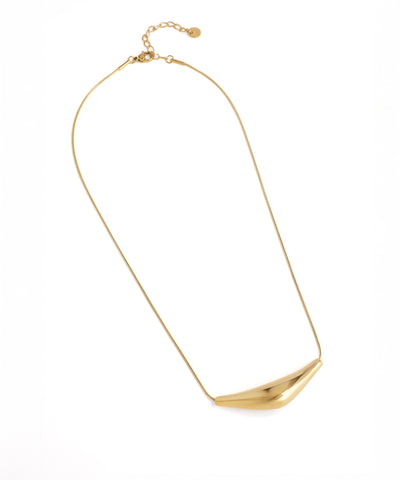 Gold necklace with a unique pendant on a white background