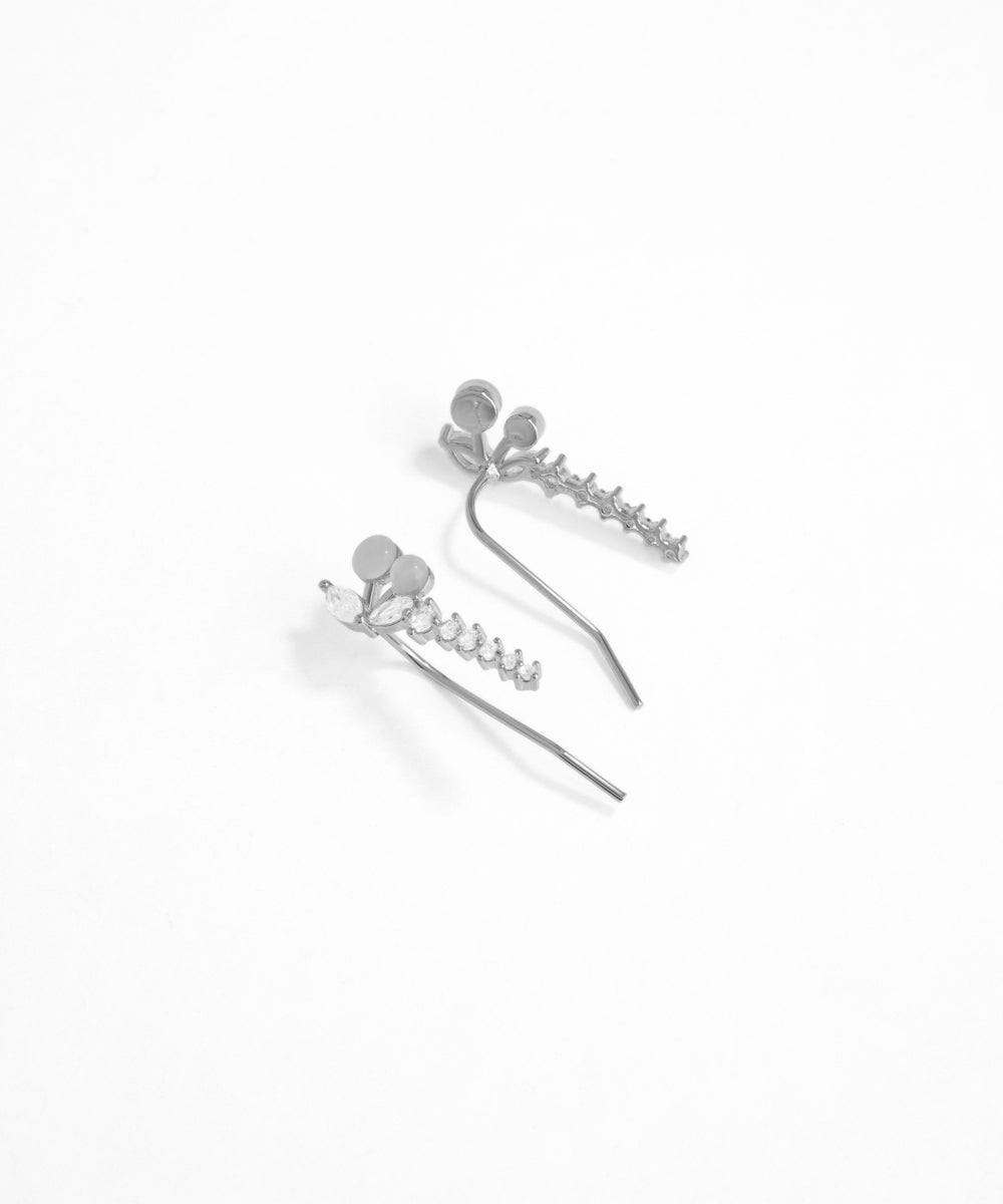 Silver hair accessories on a white background