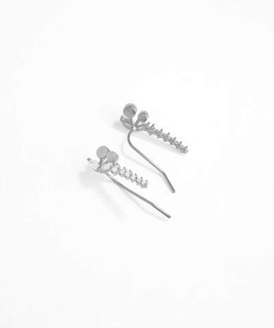 Silver hair accessories on a white background