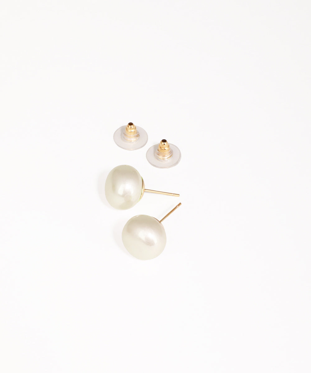 Pair of pearl earrings on a white background