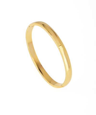 Gold bracelet on a white background