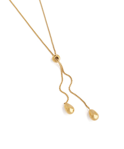 Gold necklace with teardrop-shaped pendants on a white background