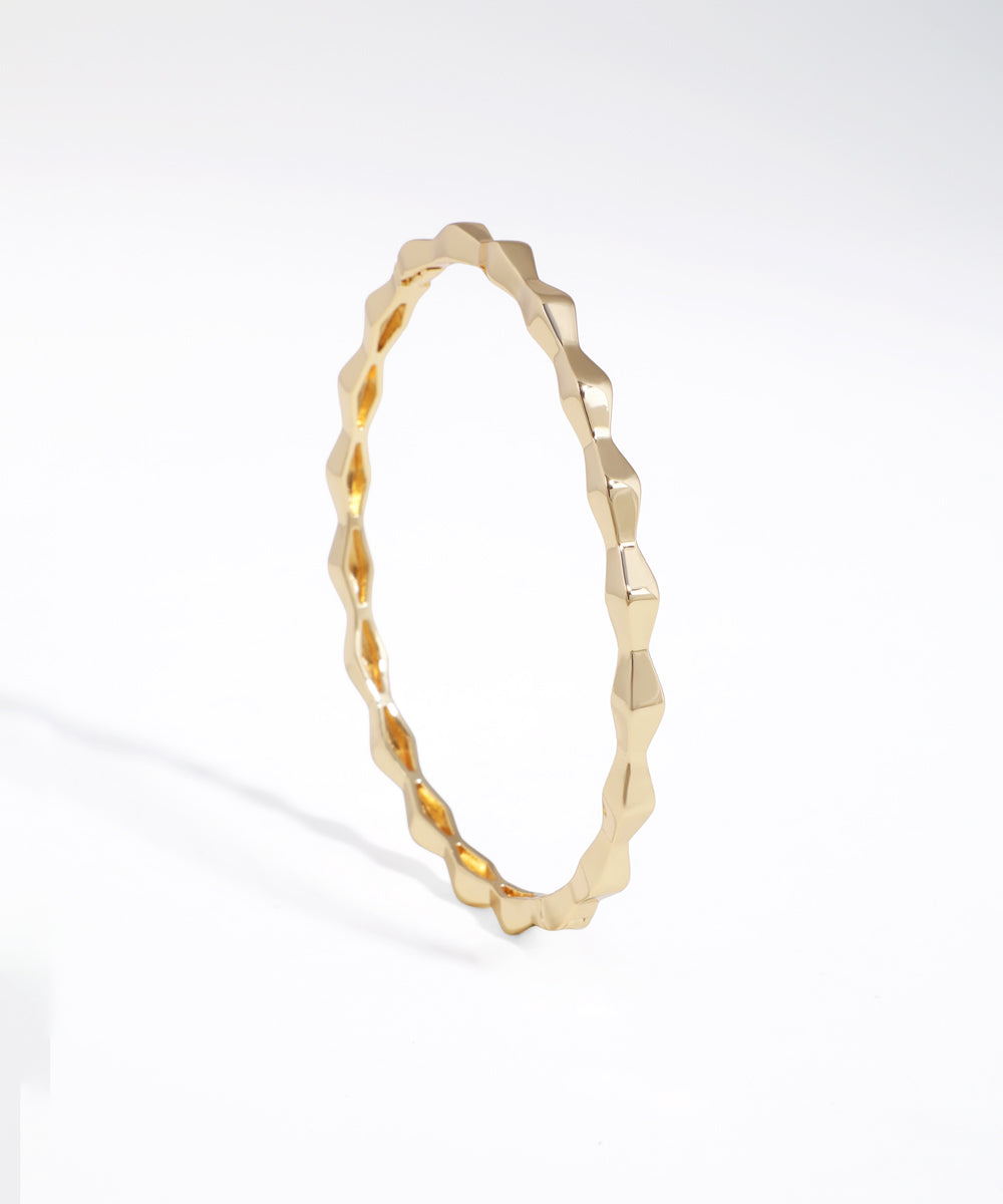 Gold-tone bracelet with a contemporary geometric sculpted design