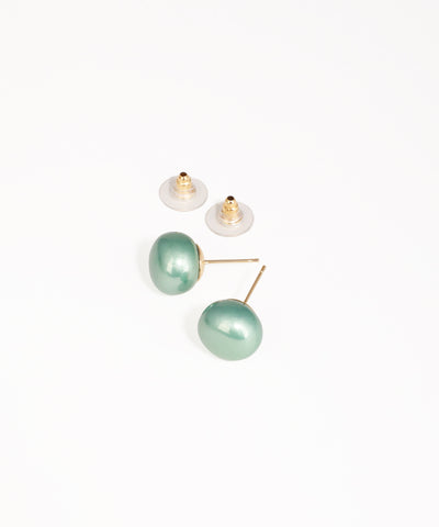 Pair of green pearl earrings on a white background