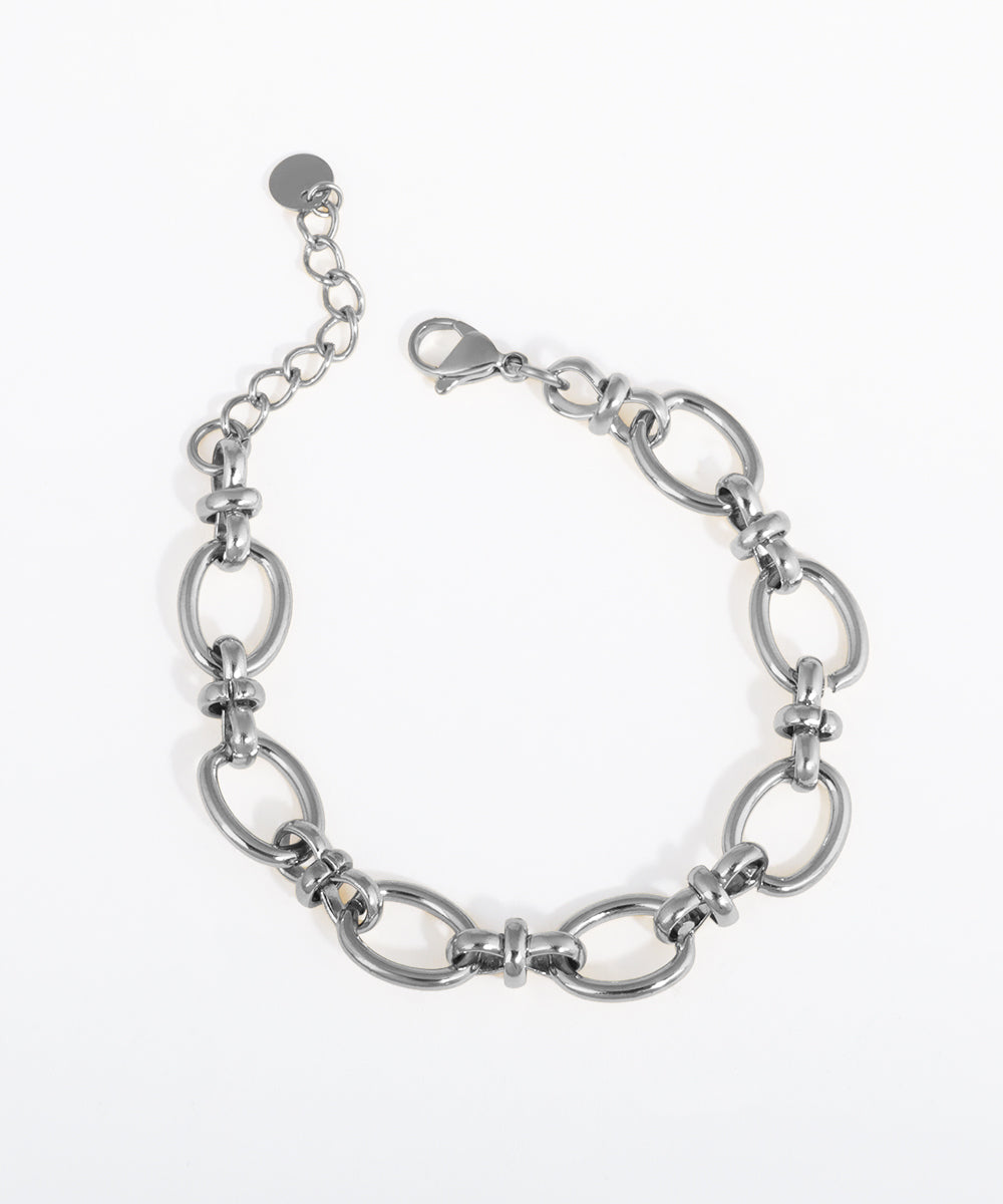 Silver chain bracelet on a white background