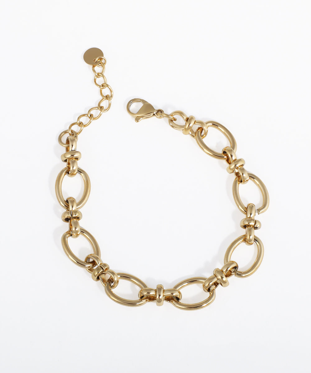 Gold-tone bracelet with chunky oval interlinked chain design and lobster clasp closure