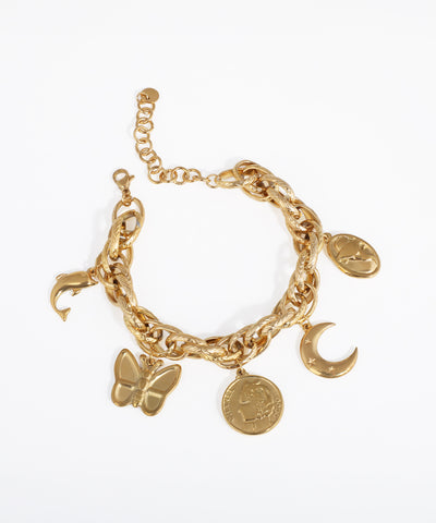 Gold-tone chain link bracelet with dolphin, butterfly, coin, horse, and crescent moon charms.