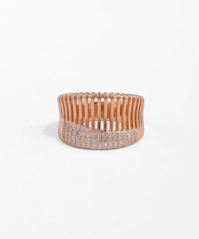 Rose gold bracelet with clear stones on a white background
