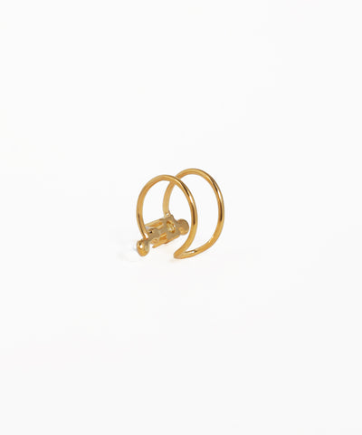 Gold earring on a white background