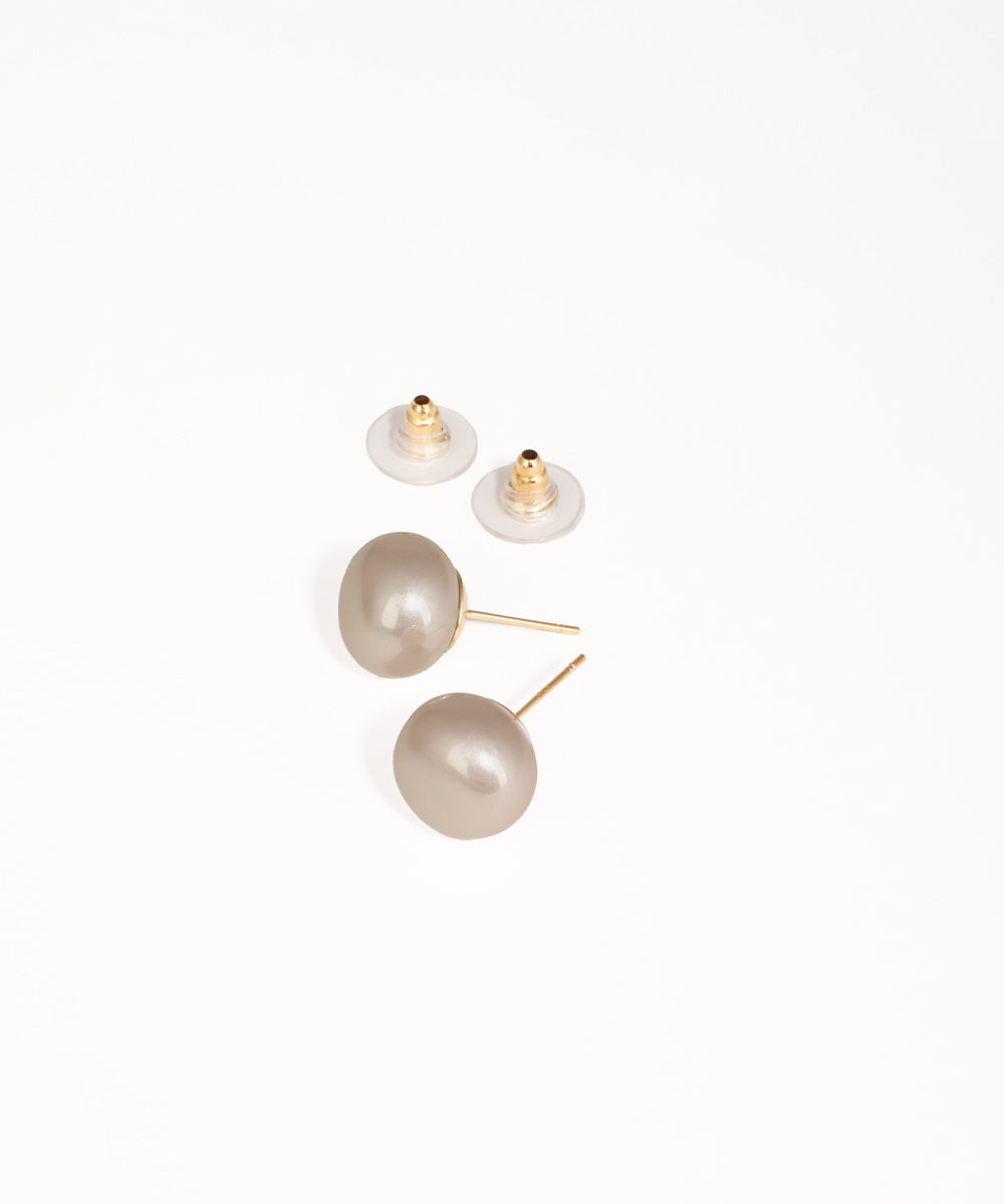 Pair of pearl earrings on a white background